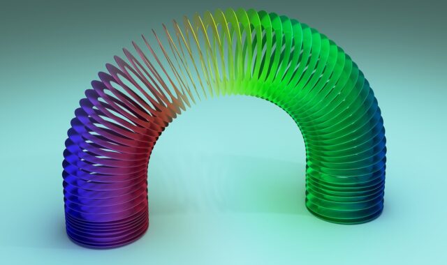 slinky, spring, rainbow, colorful, metallic, reflect, stretch, stretching, curve, flexible, coil, toy, elasticity, arch, closeup, macro, spectrum, spiral, tension, twisted, 3d, nature, play, circle, helix, vibrant